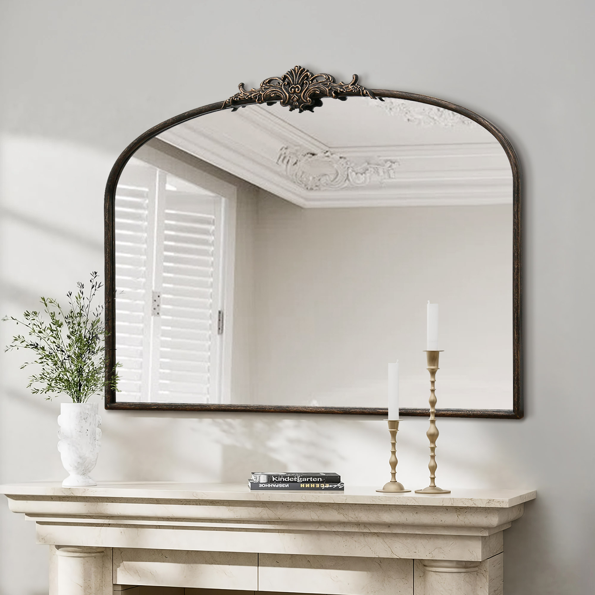 Elegant Antique Arch Bathroom Victorian Mirror Collection in brass finish brightening up a entryway with its reflective surface
